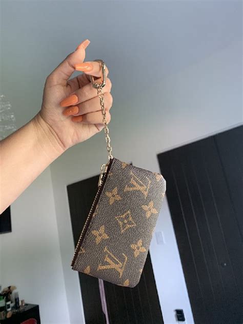 lv key pouch zipper|lv key pouch men.